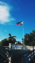 Low angle view of flag against sky