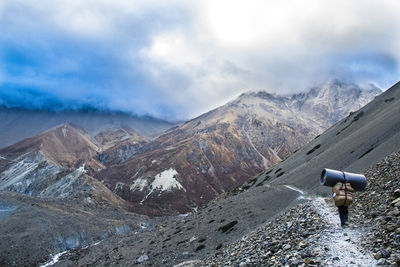 Sherpa carrying mattress in himalaya