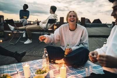 Group of people sitting in restaurant