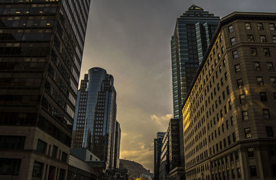 Low angle view of skyscrapers at night