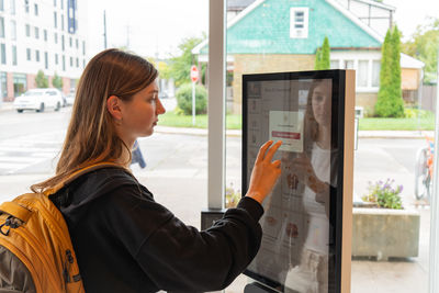 Young woman using mobile phone