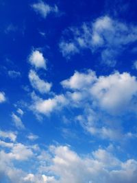 Low angle view of clouds in blue sky