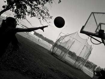 Low angle view of basketball hoop against sky