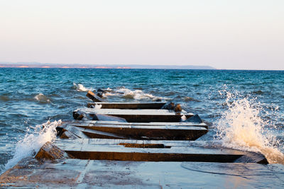 Scenic view of sea against clear sky