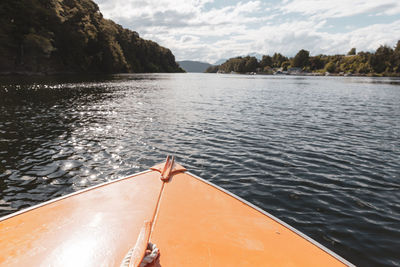 Scenic view of sea against sky from a canoe