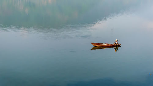 High angle view of person in boat on lake