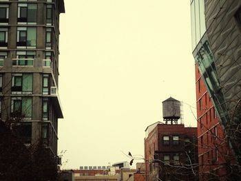 Low angle view of buildings against clear sky