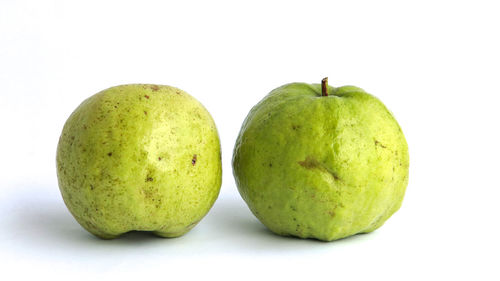 Close-up of apple against white background