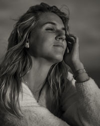 Close-up of young woman looking away