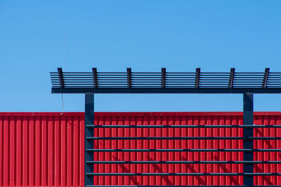 Low angle view of building against clear blue sky