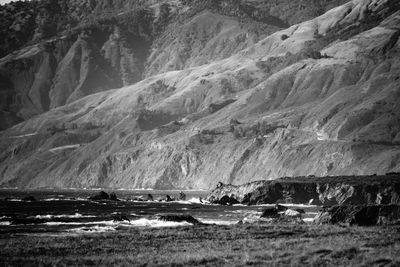 Scenic view of sea and snowcapped mountains