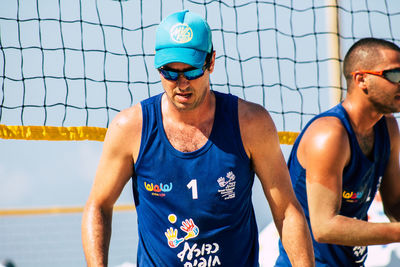 Young man standing outdoors