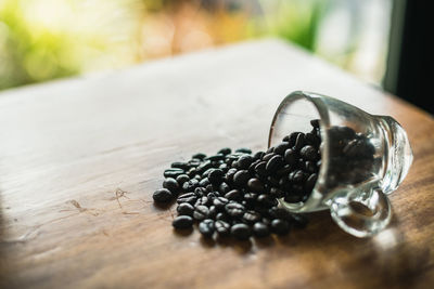 High angle view of black coffee beans on table