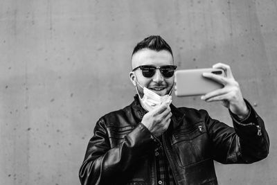 Portrait of young man wearing sunglasses