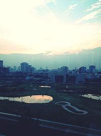 View of cityscape at sunset