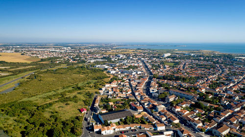 High angle shot of townscape against sky