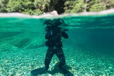 Man swimming in sea