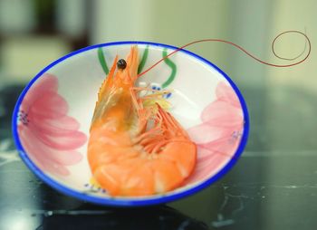 Close-up of shrimp in plate on table