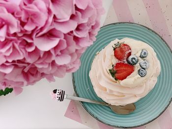 High angle view of pink roses on table