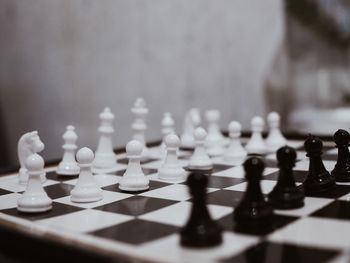 Close-up of chess pieces on board