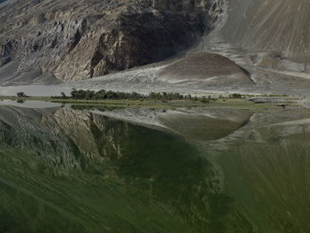 Reflection of mountain on lake at nubra valley