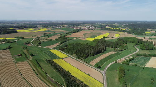 Aerial view of agricultural field against sky