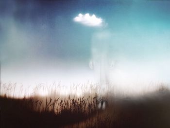 Scenic view of field against sky at night