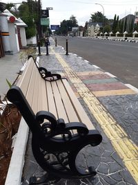 High angle view of bench on street