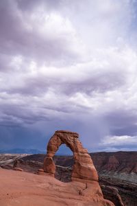 Rock formation on land against sky