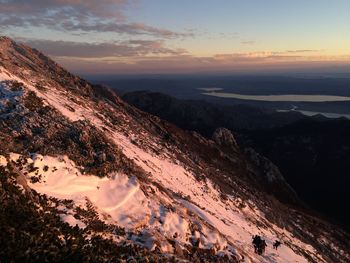 Scenic view of mountains against sky during sunset