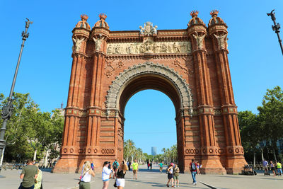 Group of people in front of historical building