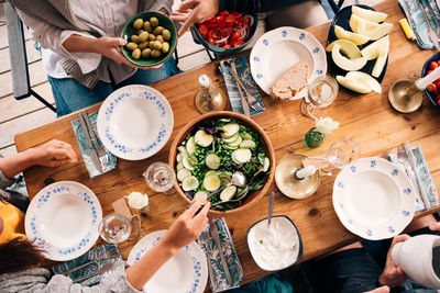 High angle view of friends having lunch together