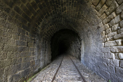 View of old wall in tunnel