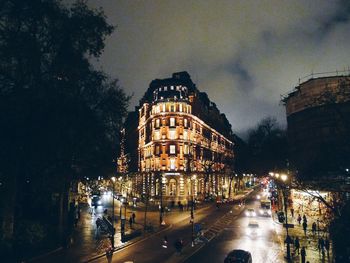 Illuminated buildings in city at night