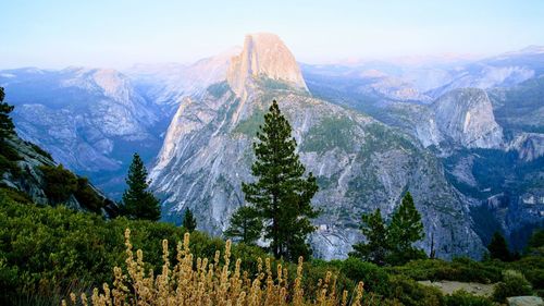 Panoramic view of mountain range against sky