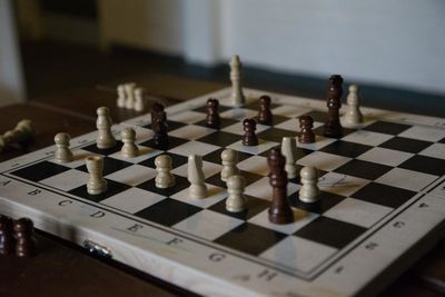 Close-up of chess pieces on board