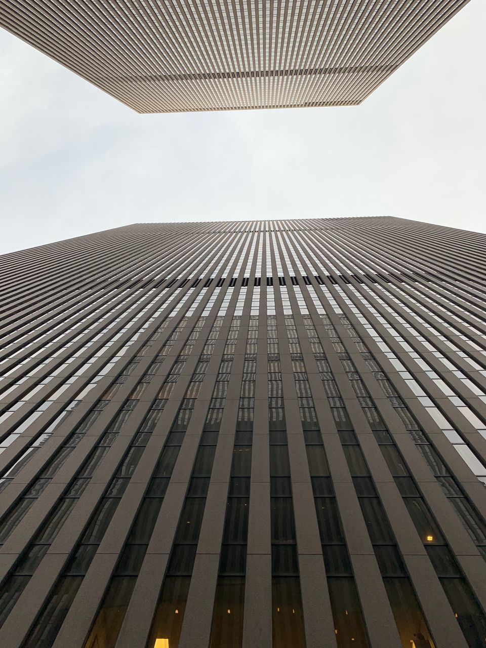 built structure, architecture, building exterior, low angle view, sky, building, tall - high, modern, city, office, office building exterior, no people, skyscraper, day, pattern, nature, tower, clear sky, outdoors, directly below, financial district