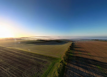 An aerial view on a misty autumn morning over cranborne chase aonb in wiltshire, uk