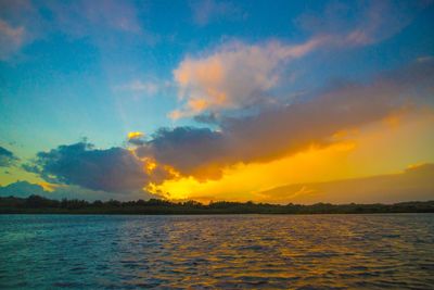 Scenic view of dramatic sky over sea