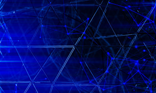 Full frame shot of illuminated cables against blue background