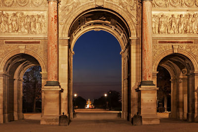 Carvings on illuminated arc de triomphe du carrousel