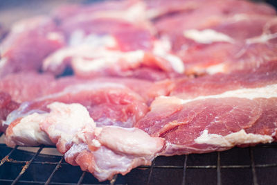 Close-up of meat on barbecue grill