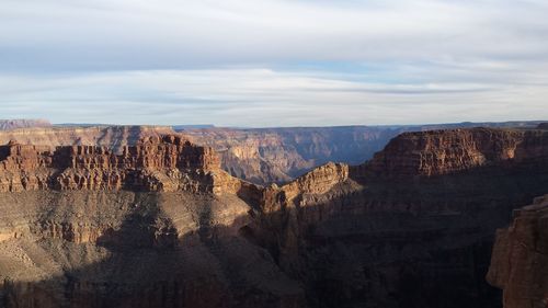 Panoramic view of rock formation against sky