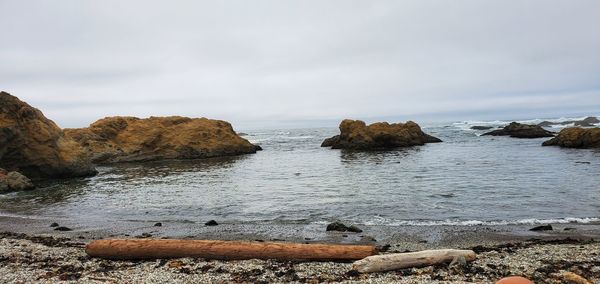 Shoreline view of rocks in the surf on manchester beach, ca.