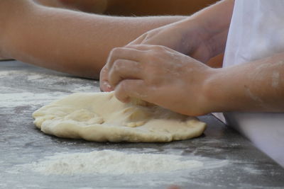 Close-up of woman preparing food