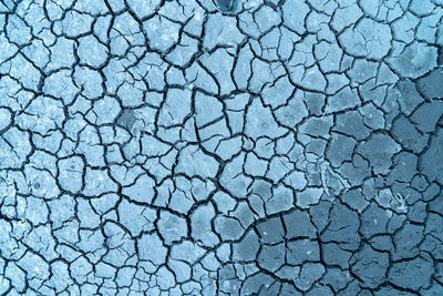 Mudflat cracked desert for natural background layer wallpaper of drought effects of global warming