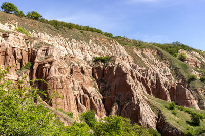 Scenic view of rocky mountains against sky