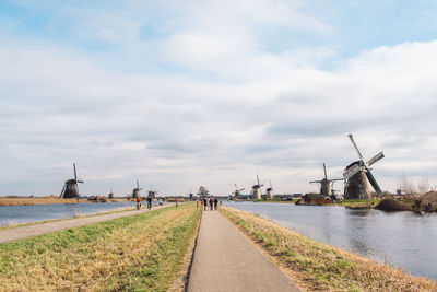 Panoramic view of traditional windmill against sky