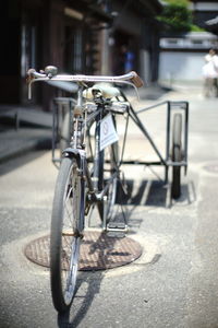 Bicycle parked on footpath in city