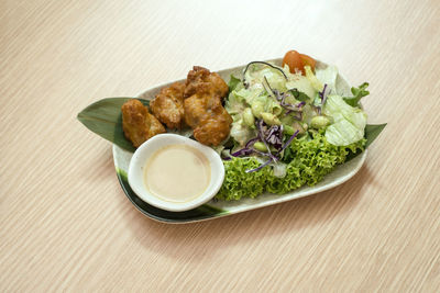 Close-up of chicken karaage served in plate